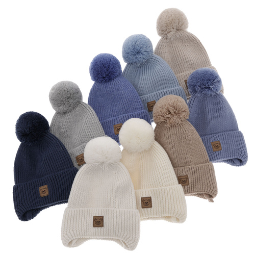 Jongens wintermuts, blauw, 100% Merino Wol, gevoerd met wolvilt, met bindkoorden, Tacco