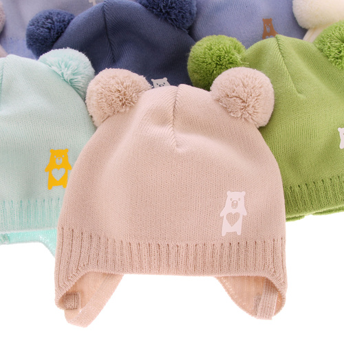 Jongens herfst/lente muts, geel, met twee pompons, met bindkoorden, Barney